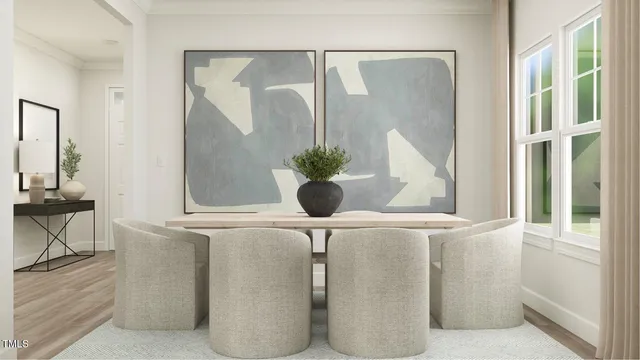 a living room with fireplace furniture and a potted plant