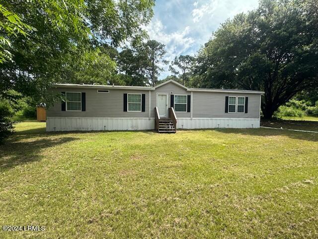 137 Coffin Point Road St. Helena Island, SC 29920 - Photo 1 of 6 Front