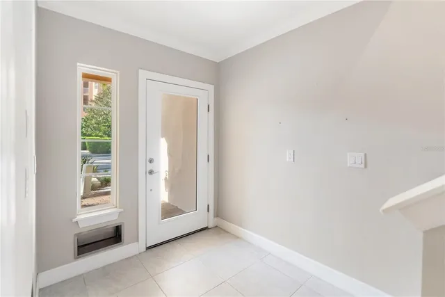 a view of an empty room and window