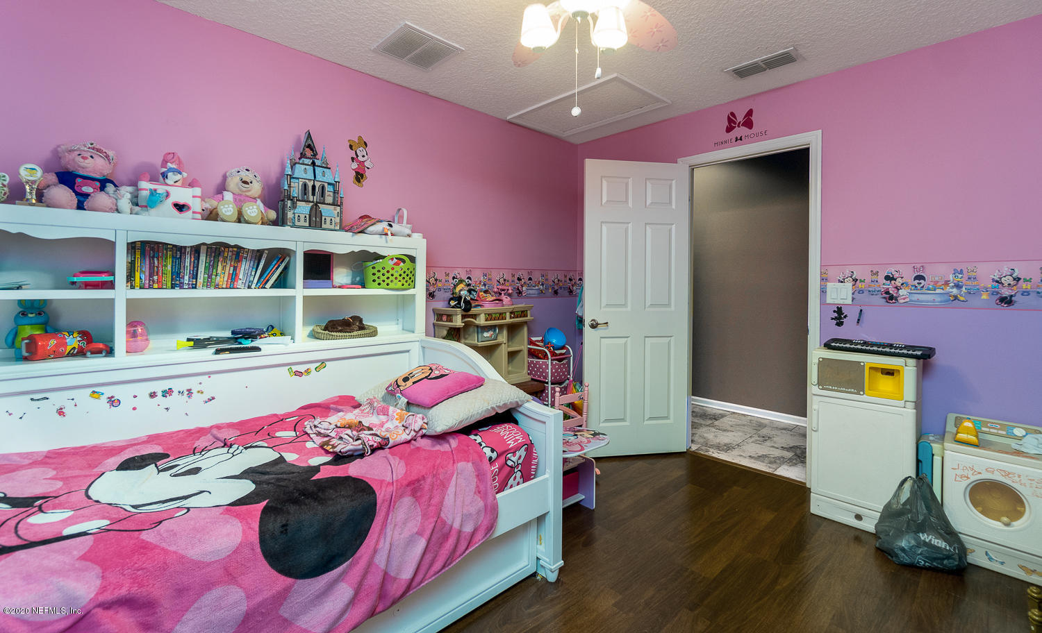 8145 Wendover Road St. Augustine, FL 32092 - Photo 20 of 55 a bedroom with furniture and a baby crib