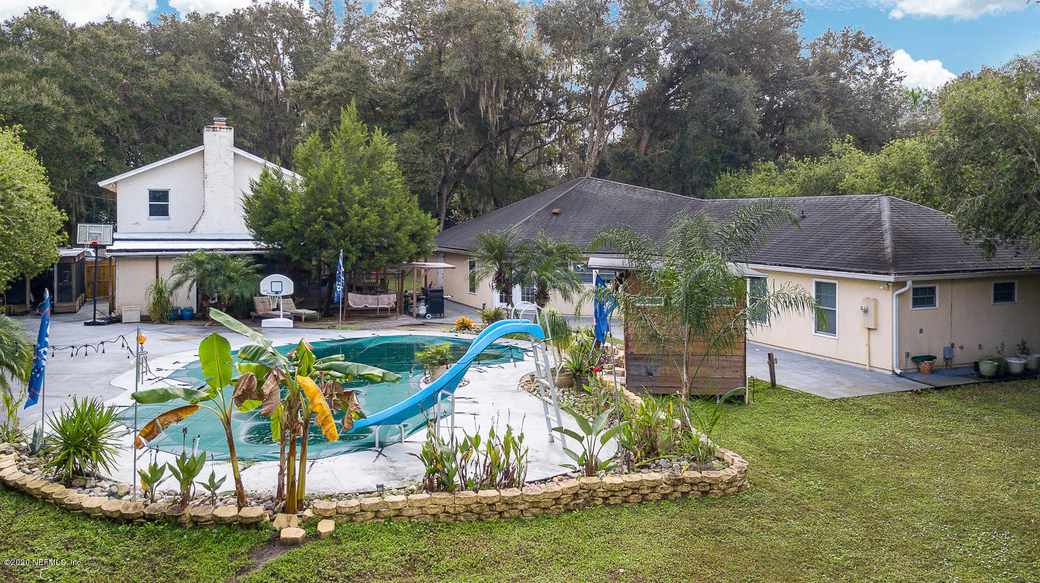 8145 Wendover Road St. Augustine, FL 32092 - Photo 2 of 55 a view of a house with a yard porch and sitting area