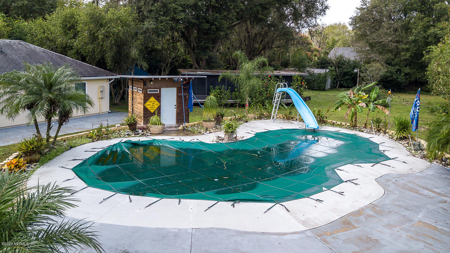8145 Wendover Road St. Augustine, FL 32092 - Photo 34 of 55 a view of a house with backyard outdoor seating and entertaining space