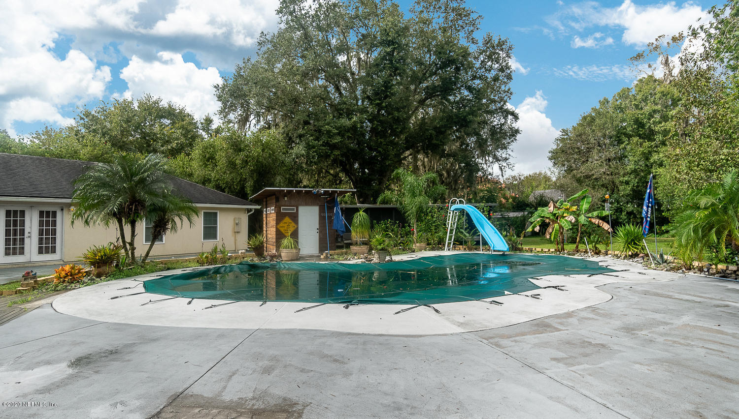 8145 Wendover Road St. Augustine, FL 32092 - Photo 35 of 55 a view of a house with a yard and large trees