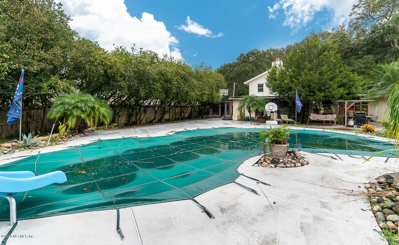 8145 Wendover Road St. Augustine, FL 32092 - Photo 37 of 55 a view of a park with plants and trees