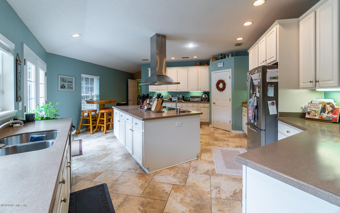 8145 Wendover Road St. Augustine, FL 32092 - Photo 7 of 55 a large kitchen with stainless steel appliances lots of counter top space