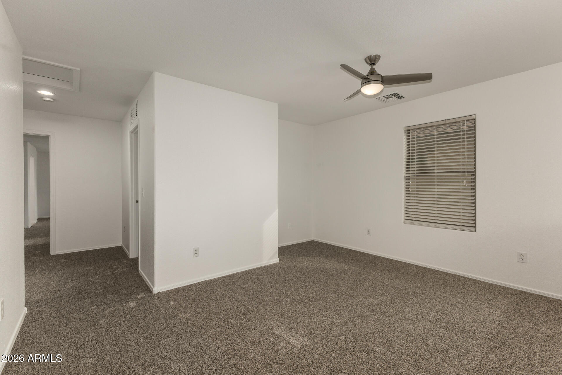 3832 East Jasper Drive Gilbert, AZ 85296 - Photo 25 of 43 a view of an empty room with a window