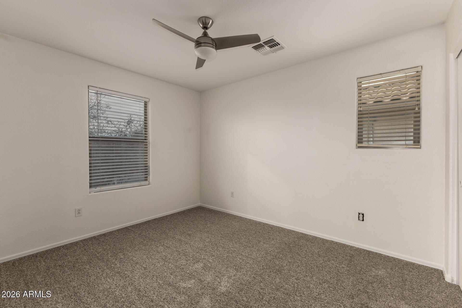 3832 East Jasper Drive Gilbert, AZ 85296 - Photo 28 of 43 a view of an empty room with a window