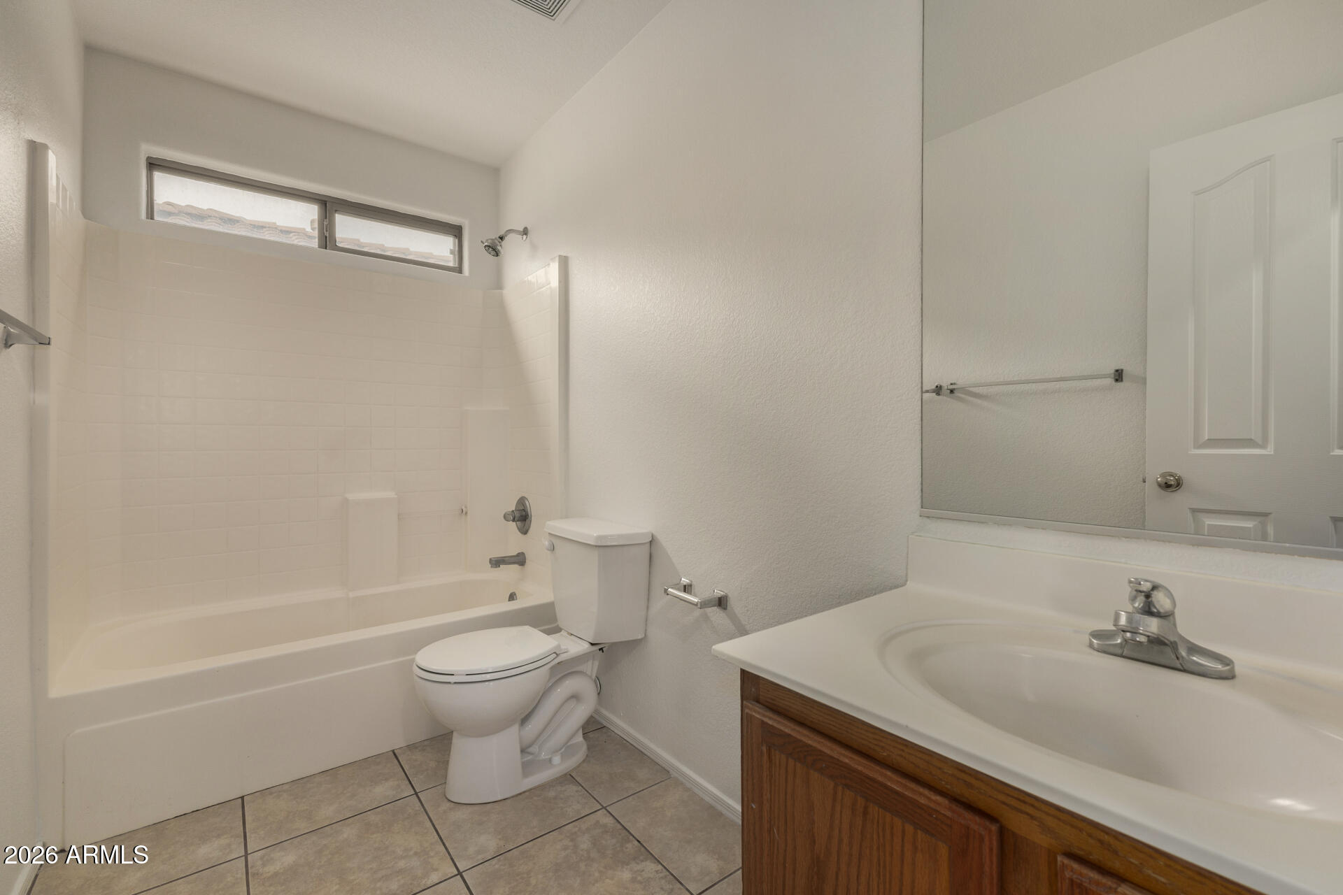 3832 East Jasper Drive Gilbert, AZ 85296 - Photo 30 of 43 a bathroom with a sink a toilet and a bathtub