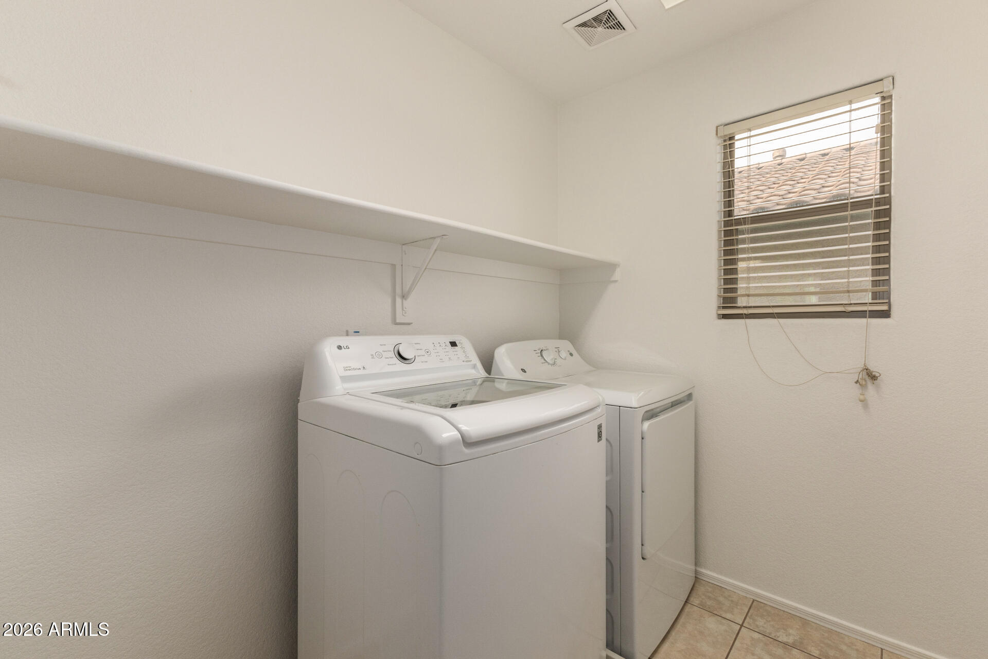 3832 East Jasper Drive Gilbert, AZ 85296 - Photo 31 of 43 a utility room with dryer and washer