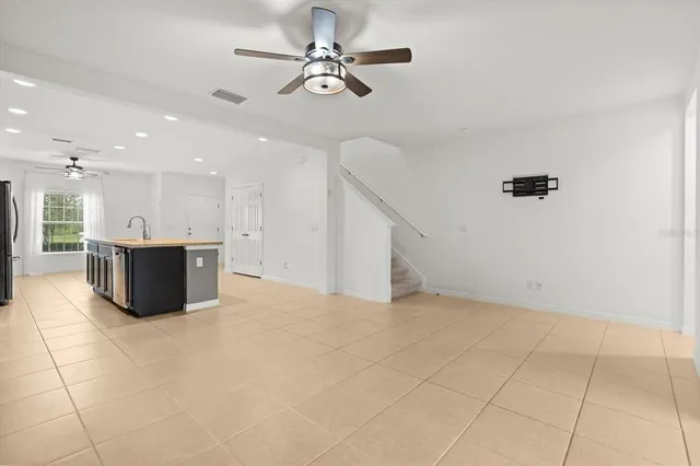 a view of a kitchen with a sink cabinets and window
