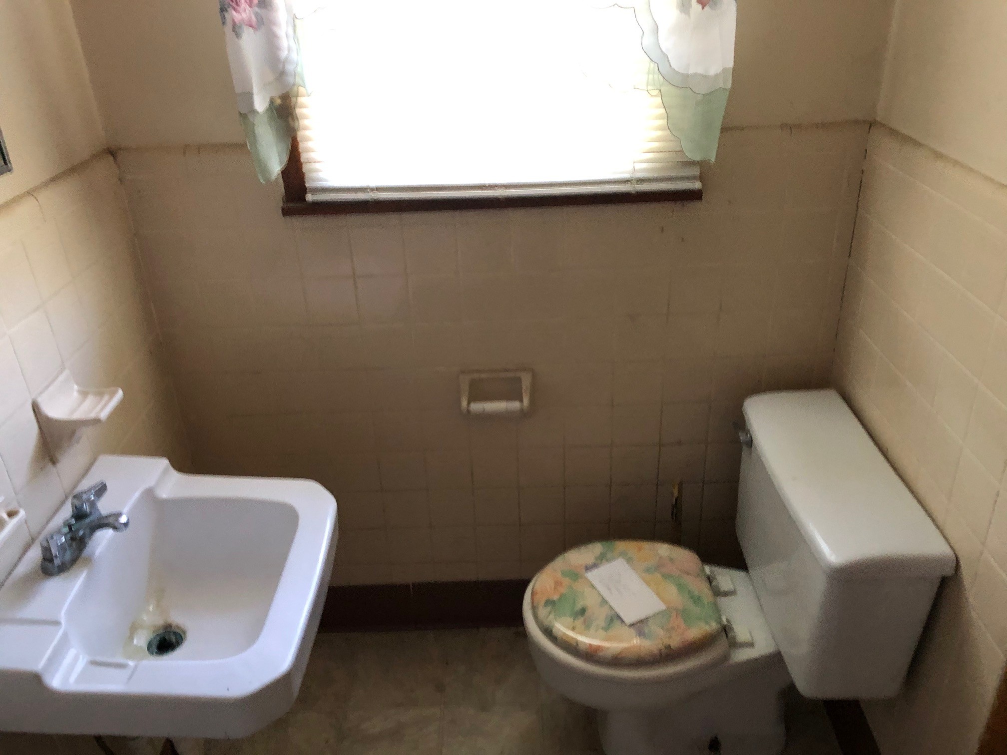 1928 Murfreesboro Road Lebanon, TN 37090 - Photo 11 of 12 a bathroom with a sink and a toilet