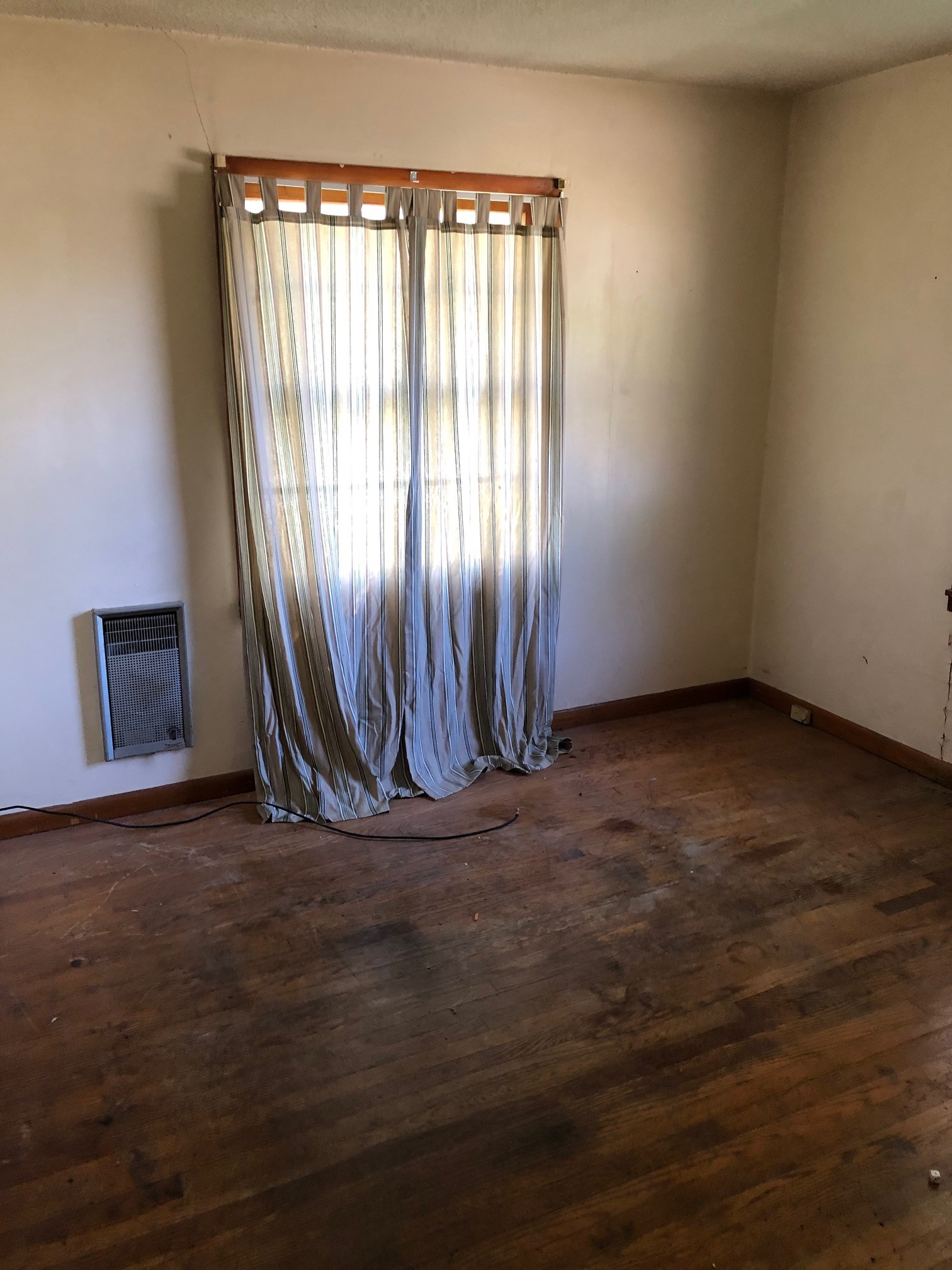 1928 Murfreesboro Road Lebanon, TN 37090 - Photo 12 of 12 an empty room with wooden floor and windows