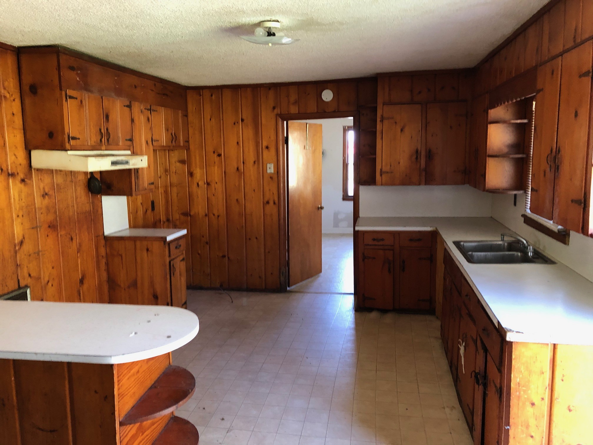 1928 Murfreesboro Road Lebanon, TN 37090 - Photo 3 of 12 a kitchen with a sink a refrigerator and wooden floor
