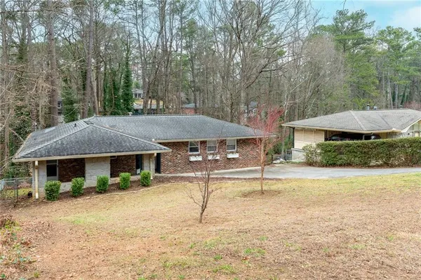 a house view with a outdoor space