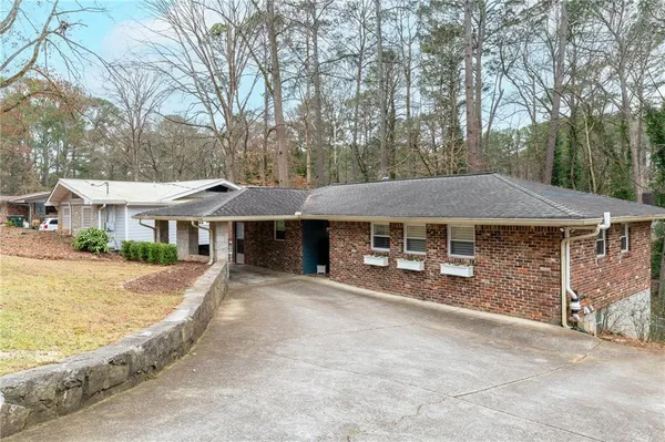 front view of a house with a yard