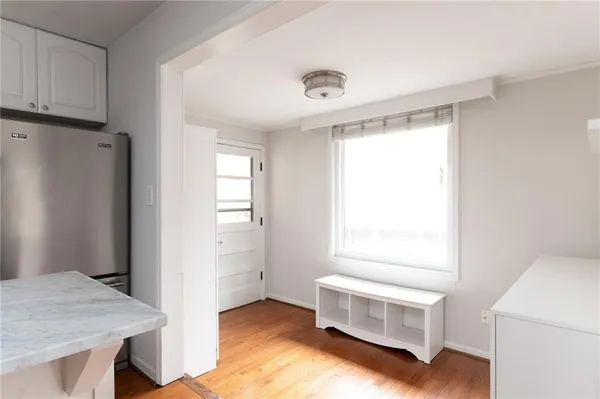 a room with window and a table