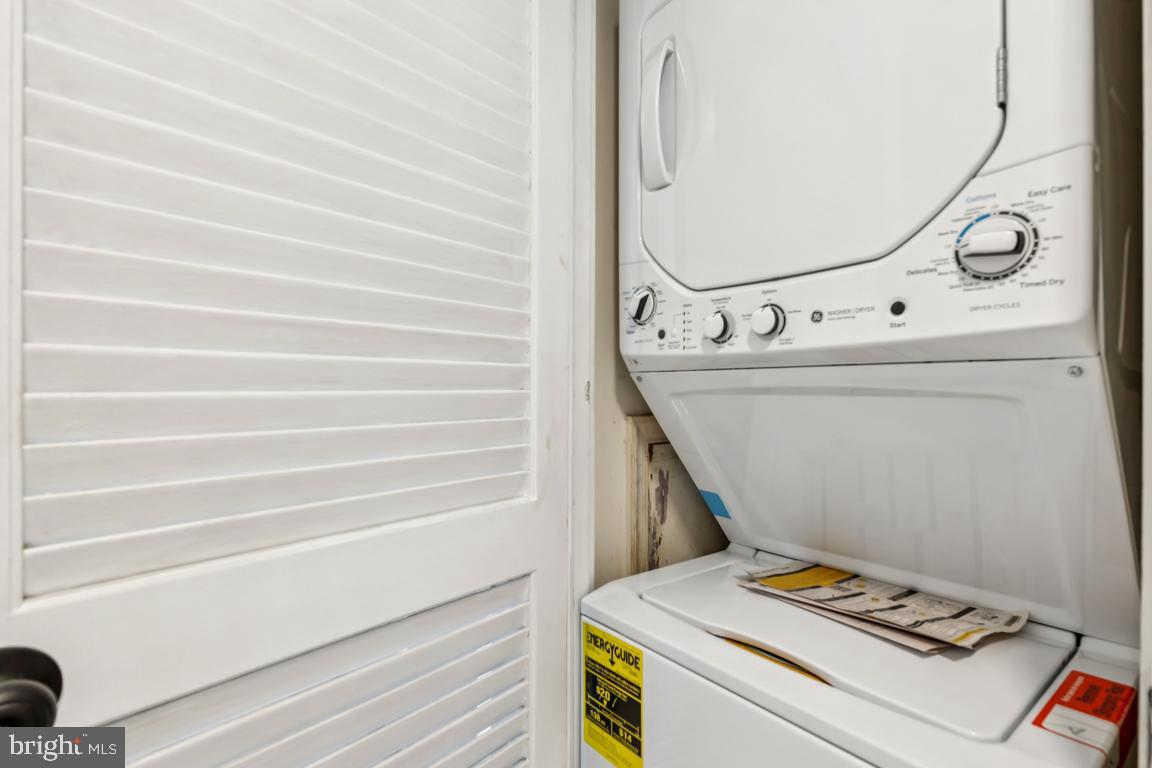 2037 38th Street Southeast, Unit 301 Washington, DC 20020 - Photo 11 of 15 a utility room with dryer and washer