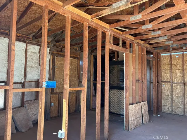 a view of a room with large windows