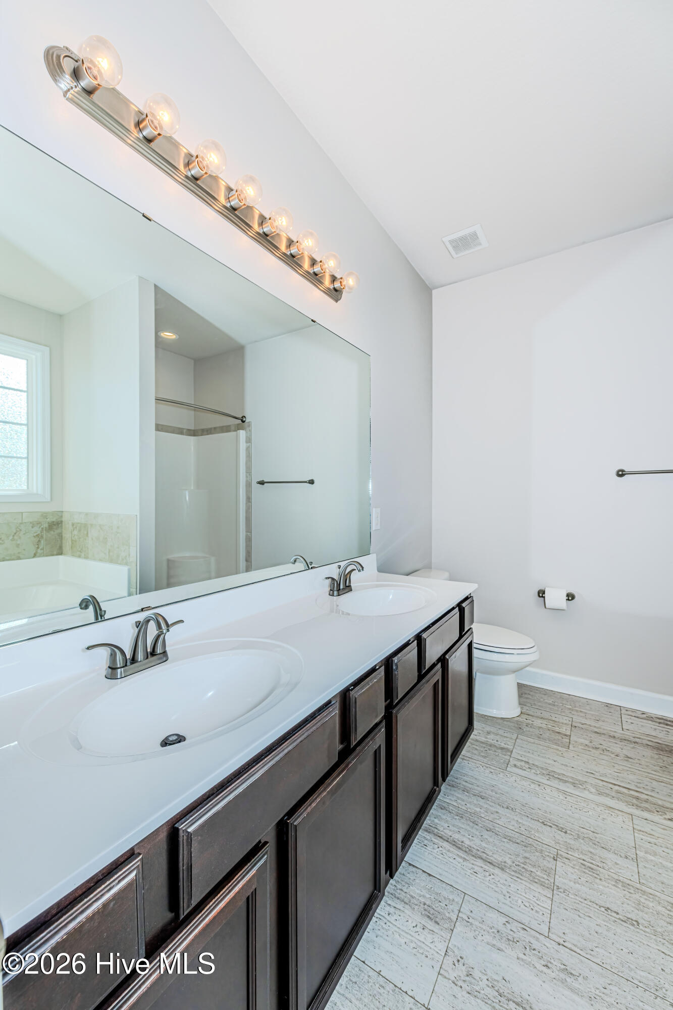 341 Frisco Way Holly Ridge, NC 28445 - Photo 24 of 61 Primary bathroom