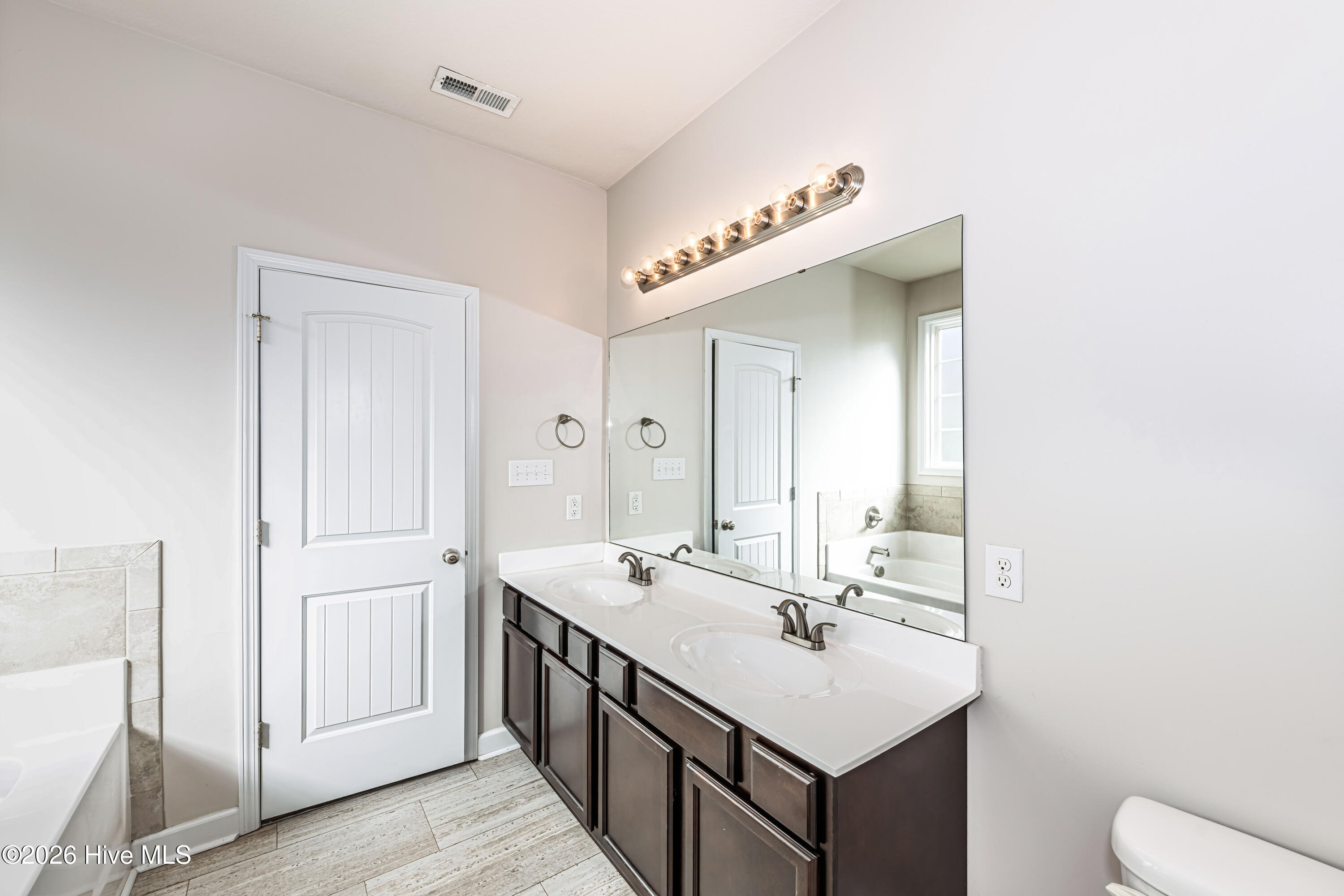 341 Frisco Way Holly Ridge, NC 28445 - Photo 26 of 61 Primary bathroom