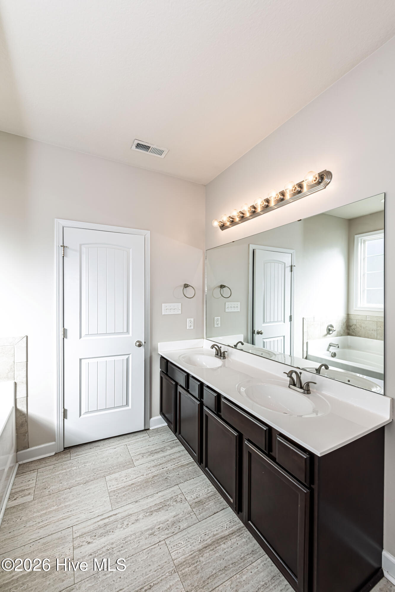 341 Frisco Way Holly Ridge, NC 28445 - Photo 27 of 61 Primary bathroom