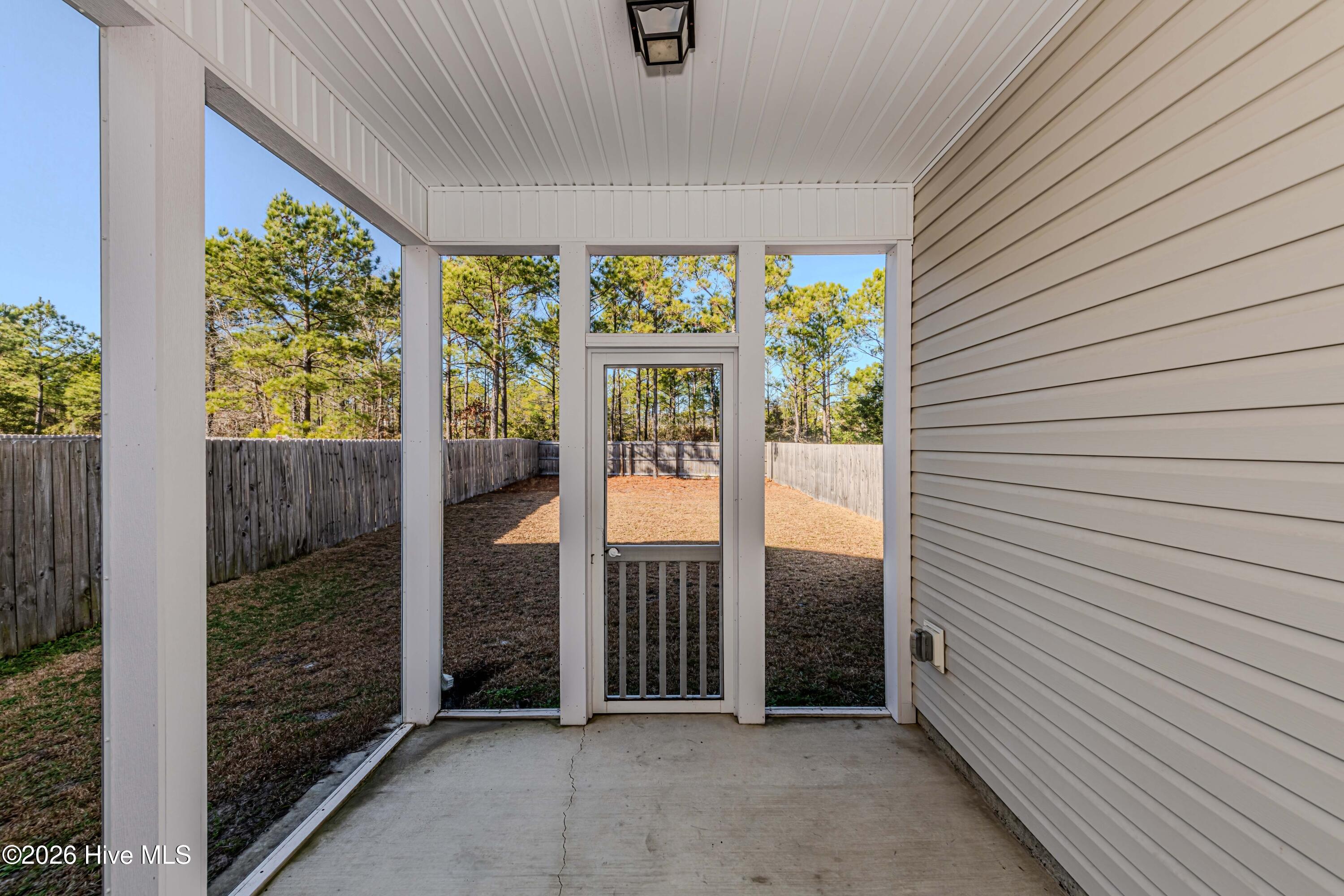 341 Frisco Way Holly Ridge, NC 28445 - Photo 45 of 61 Screened in back patio