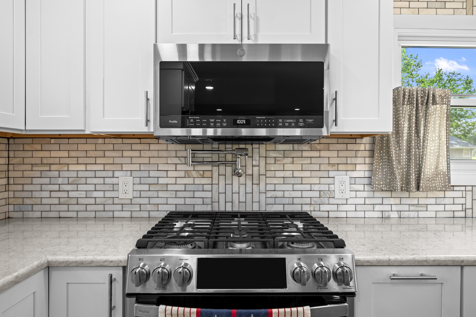 506 Bush Street Reynolds, IL 61279 - Photo 14 of 37 a stove top oven sitting inside of a kitchen