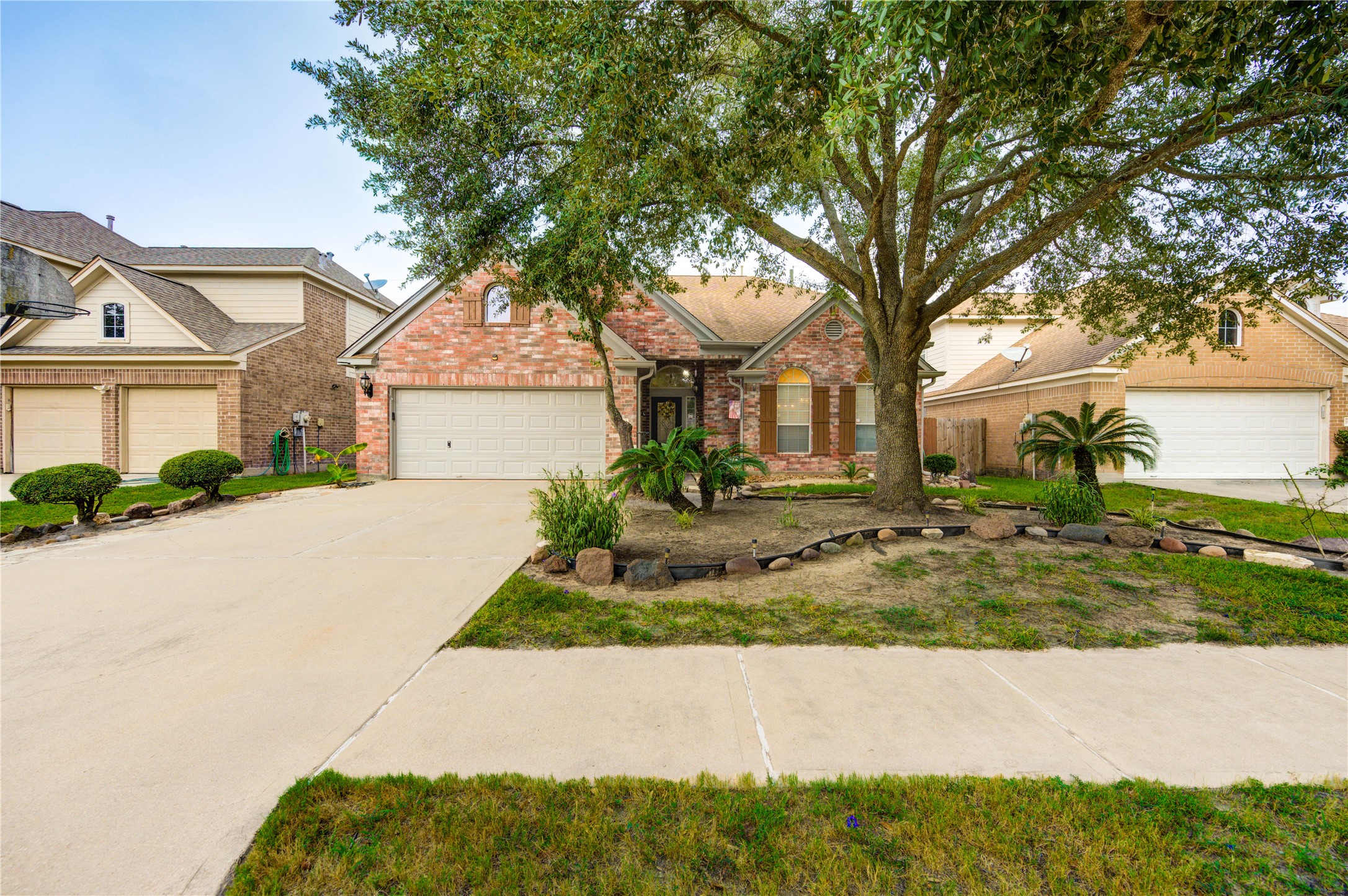 16730 Spring Barker Drive Cypress, TX 77429 - Photo 1 of 50 front view of a house with a yard