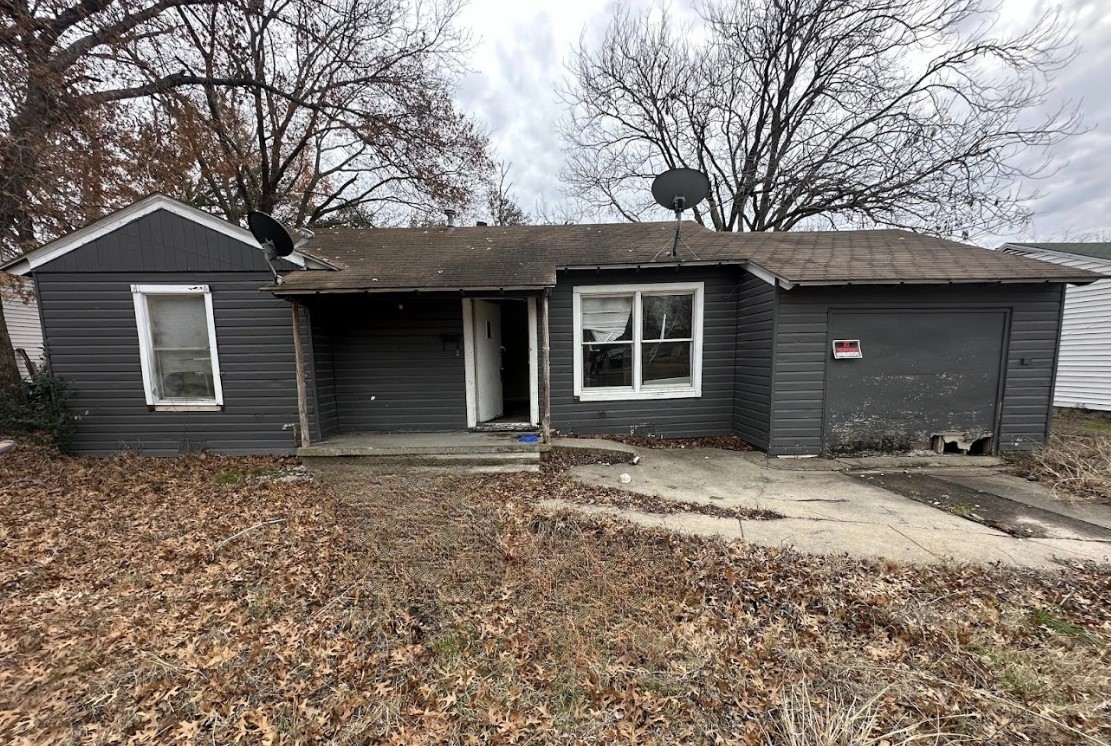a house with trees in front of it