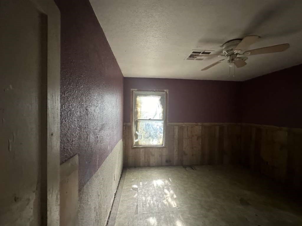 312 Mistletoe Street Marlin, TX 76661 - Photo 9 of 10 a view of empty room with windows