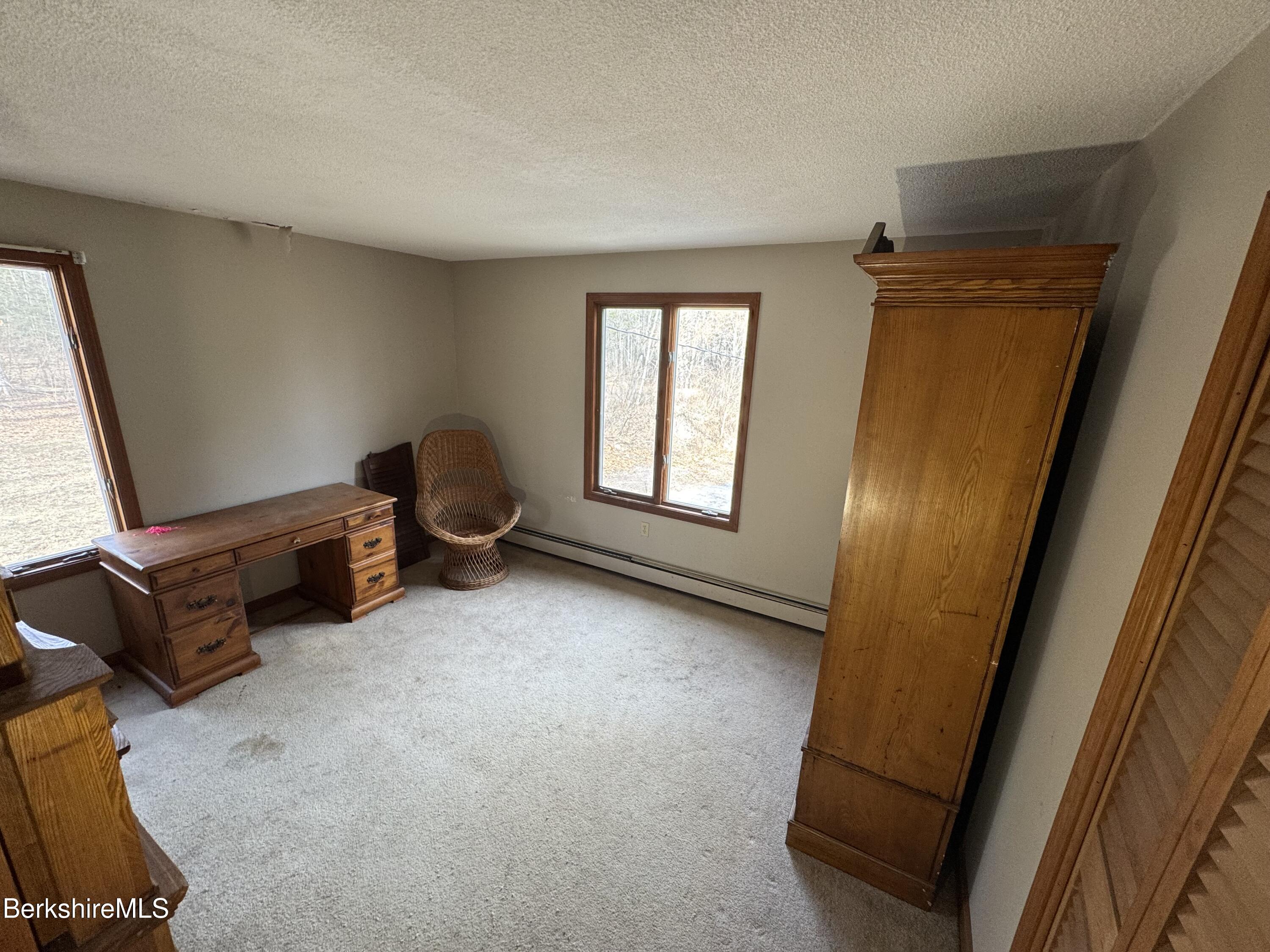 44 C Mt Washington Road Egremont, MA 01230 - Photo 16 of 25 a living room with furniture and a window