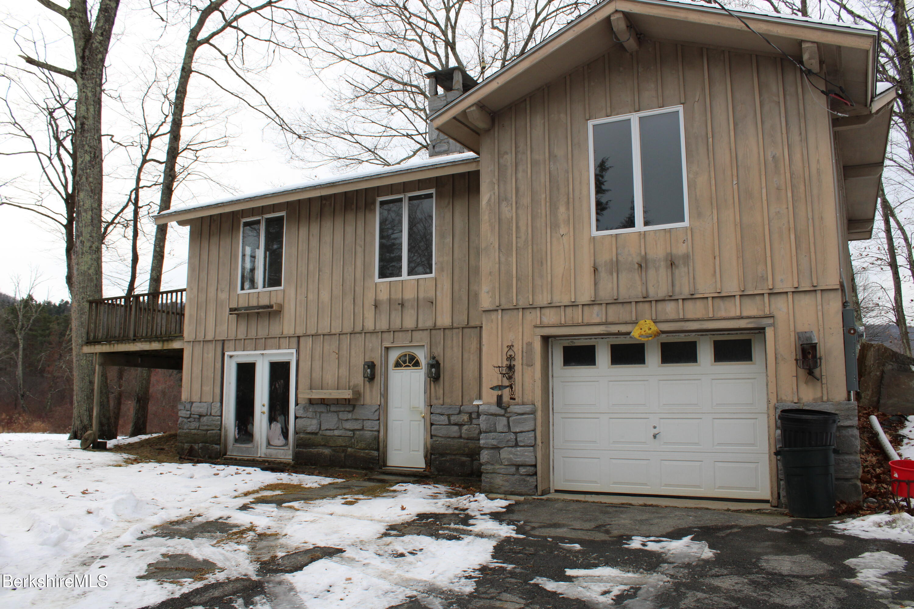 44 C Mt Washington Road Egremont, MA 01230 - Photo 23 of 25 a front view of a house with a yard