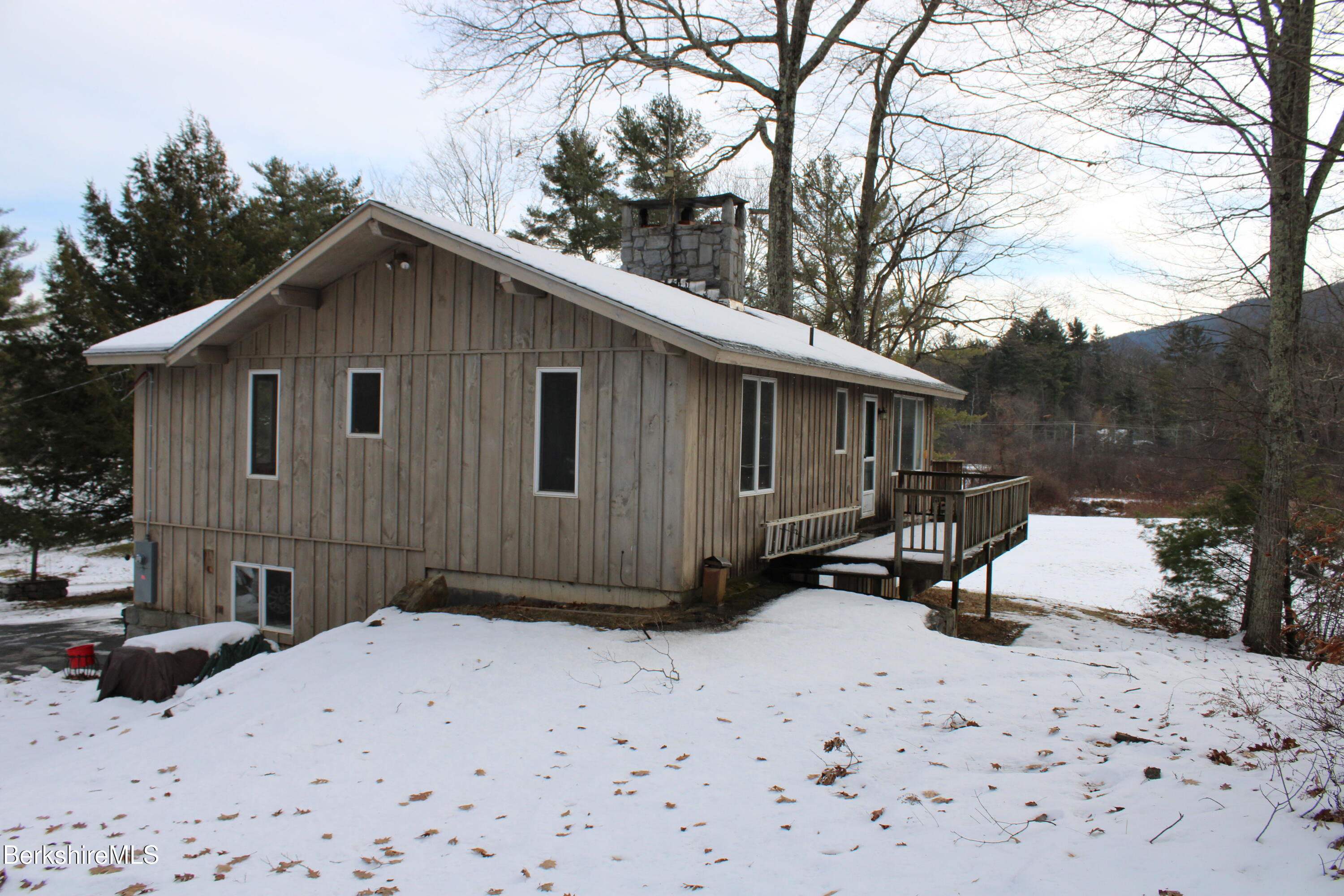 44 C Mt Washington Road Egremont, MA 01230 - Photo 24 of 25 a view of a house with a yard covered in snow