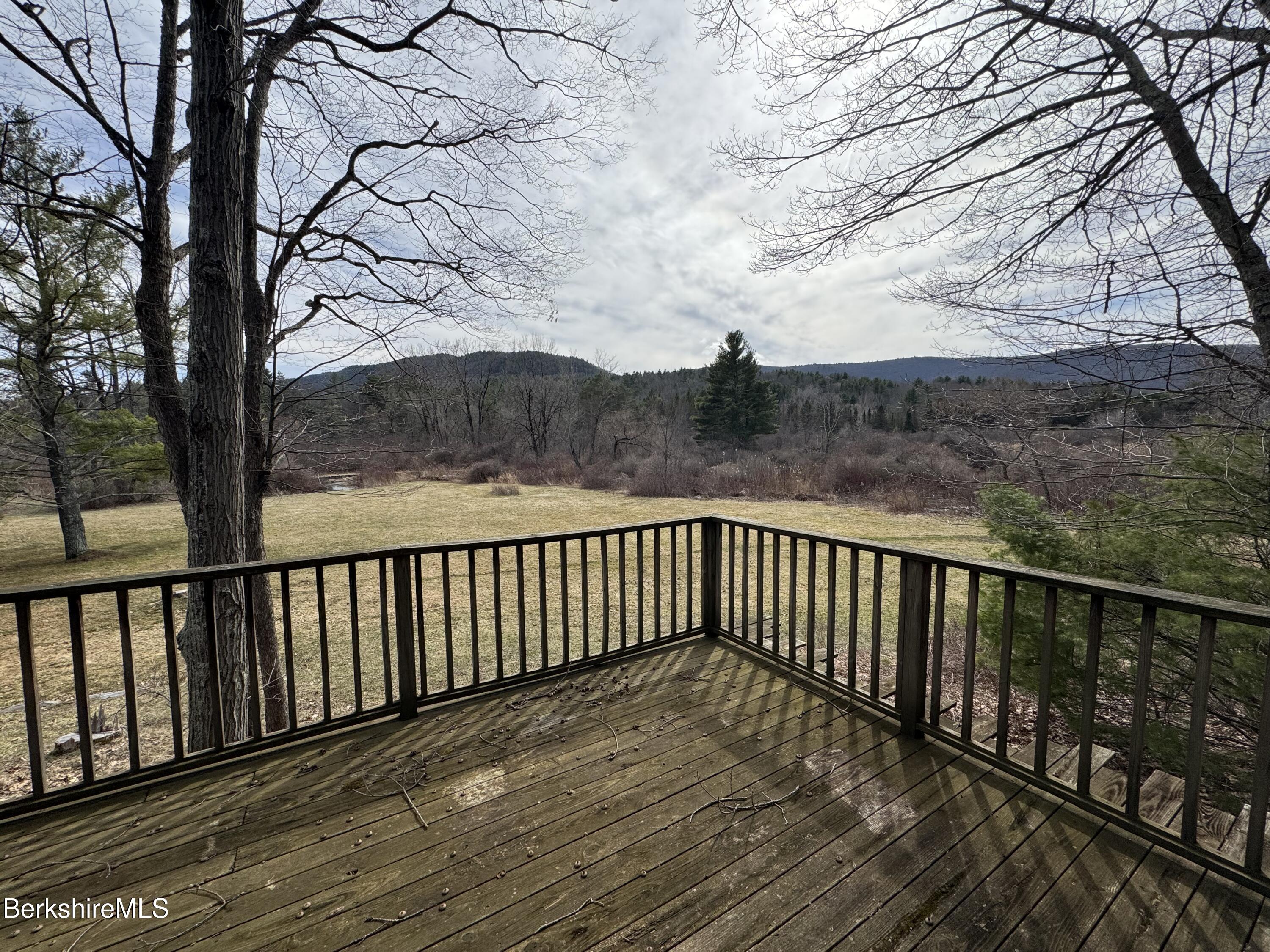 44 C Mt Washington Road Egremont, MA 01230 - Photo 6 of 25 a terrace with wooden fence and trees