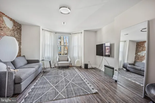 a living room with furniture and a couch