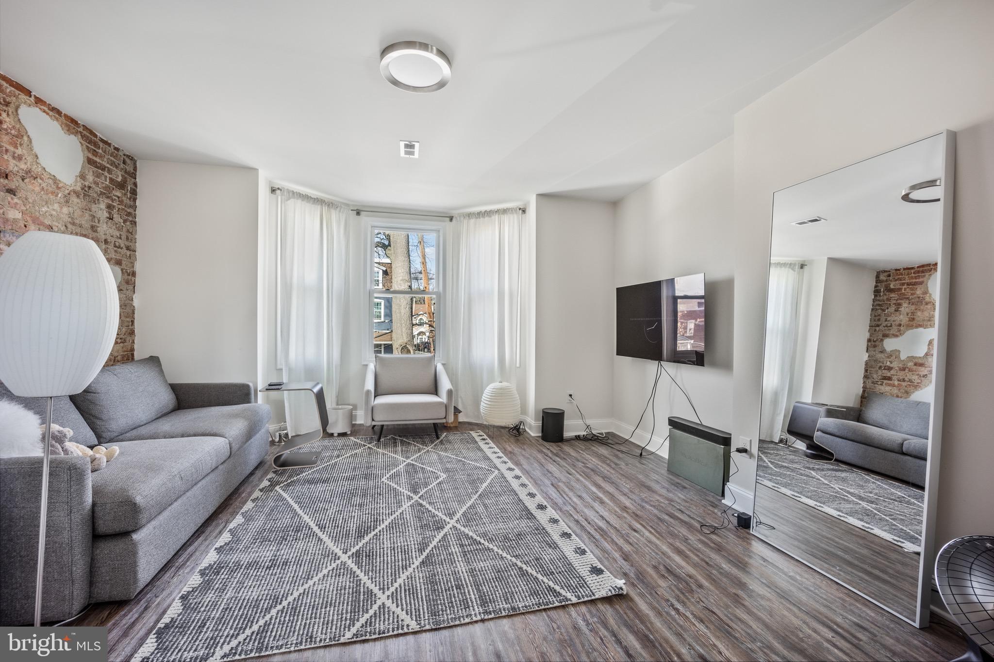 306 East Front Street Media, PA 19063 - Photo 2 of 10 a living room with furniture and a couch