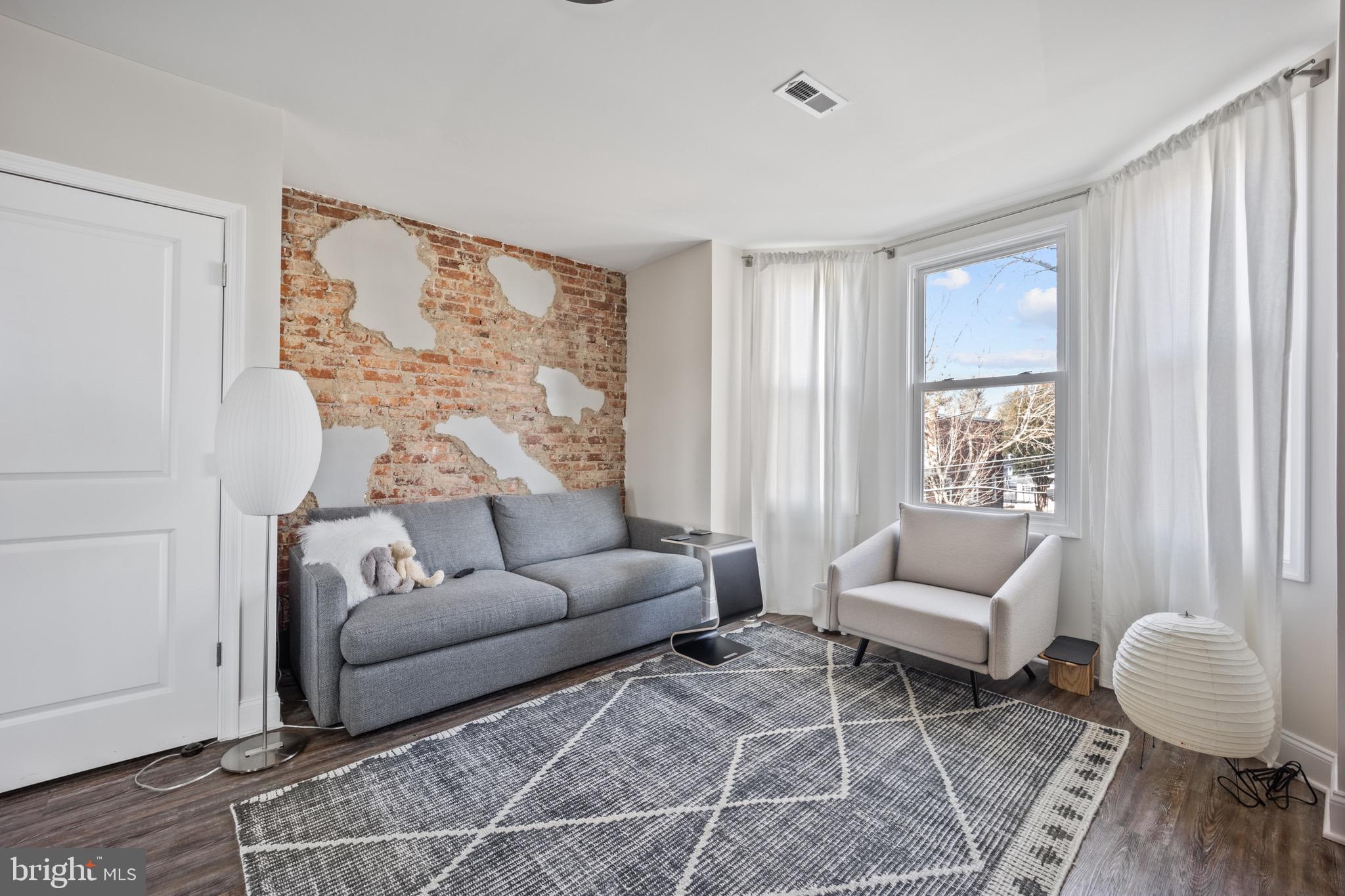306 East Front Street Media, PA 19063 - Photo 3 of 10 a living room with furniture and a window