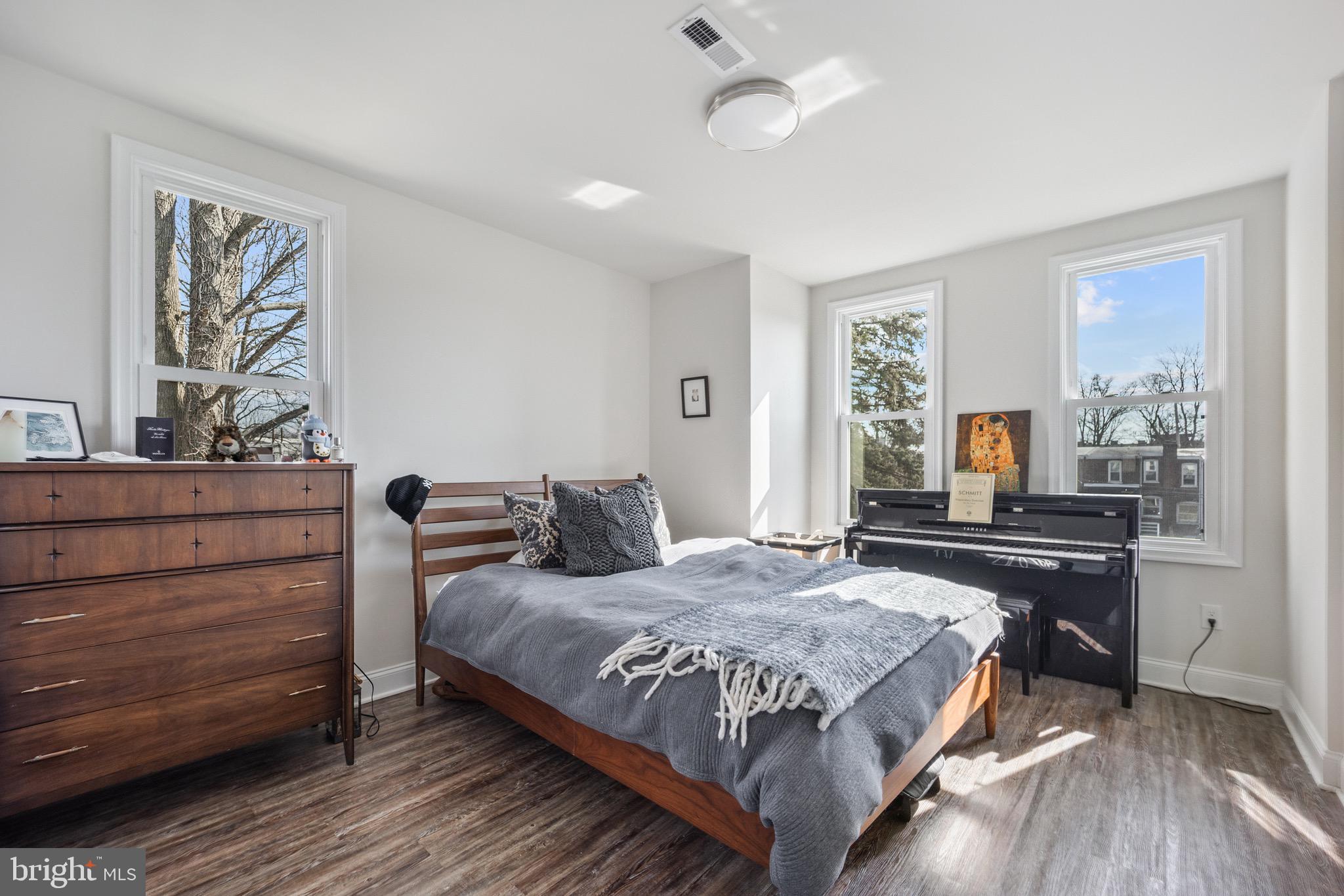 306 East Front Street Media, PA 19063 - Photo 7 of 10 a bedroom with a bed and a dresser