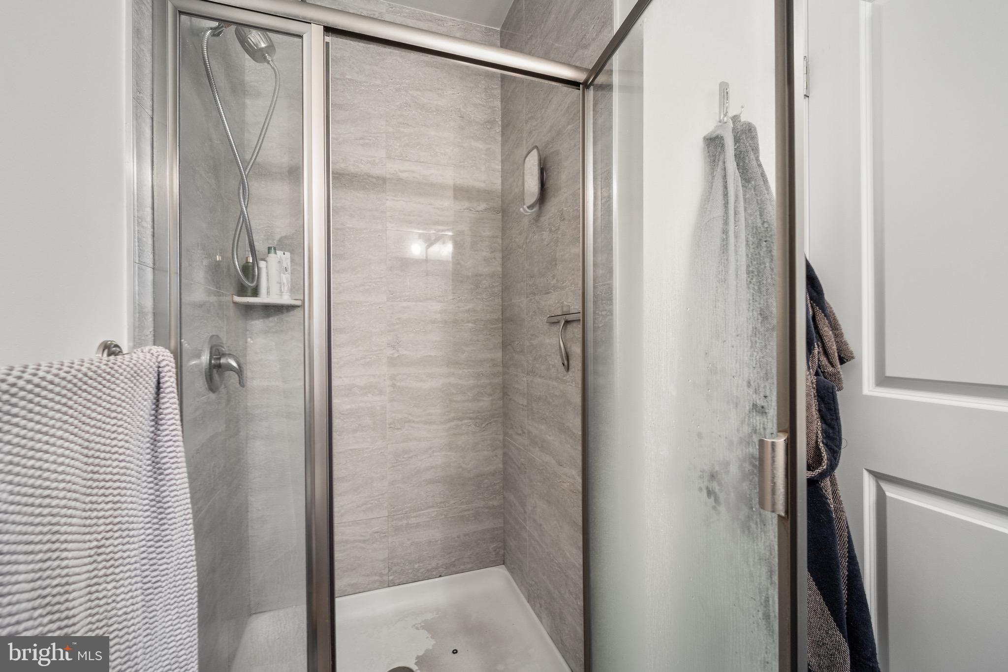 306 East Front Street Media, PA 19063 - Photo 10 of 10 a bathroom with a shower and a glass door