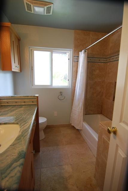 200 North Rice Road Ojai, CA 93023 - Photo 6 of 21 a bathroom with a granite countertop sink a toilet and shower