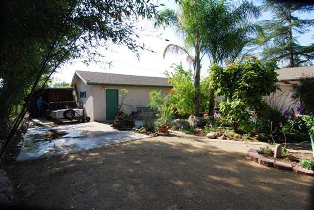 200 North Rice Road Ojai, CA 93023 - Photo 9 of 21 a view of a house with backyard and sitting area