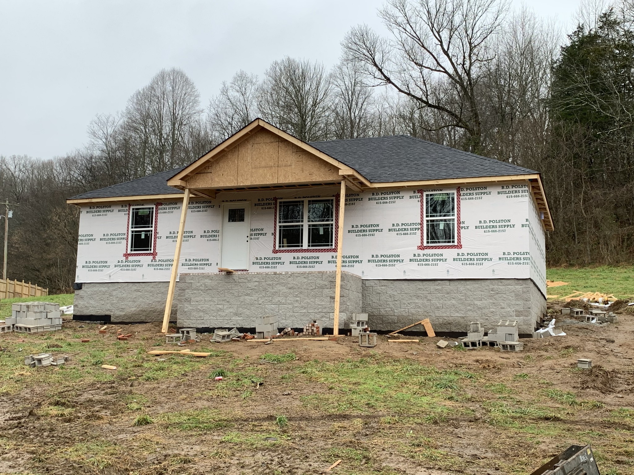 440 Leo Whitley Road Lafayette, TN 37083 - Photo 1 of 2 a front view of a house with a yard