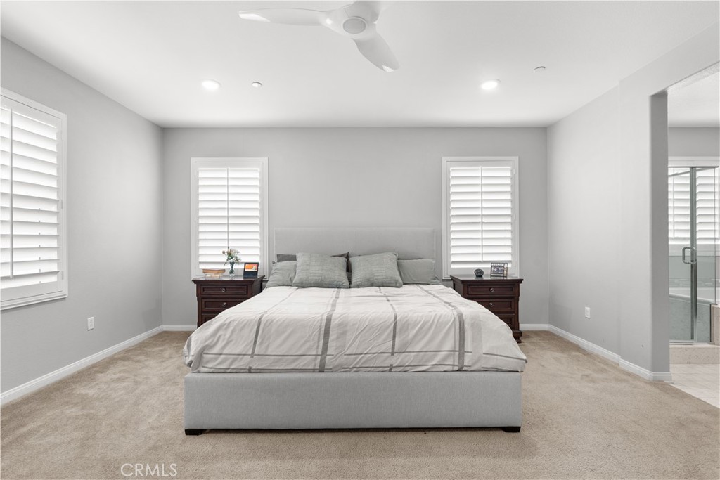 20948 Center Street Riverside, CA 92507 - Photo 49 of 92 a bedroom with a large bed and a window