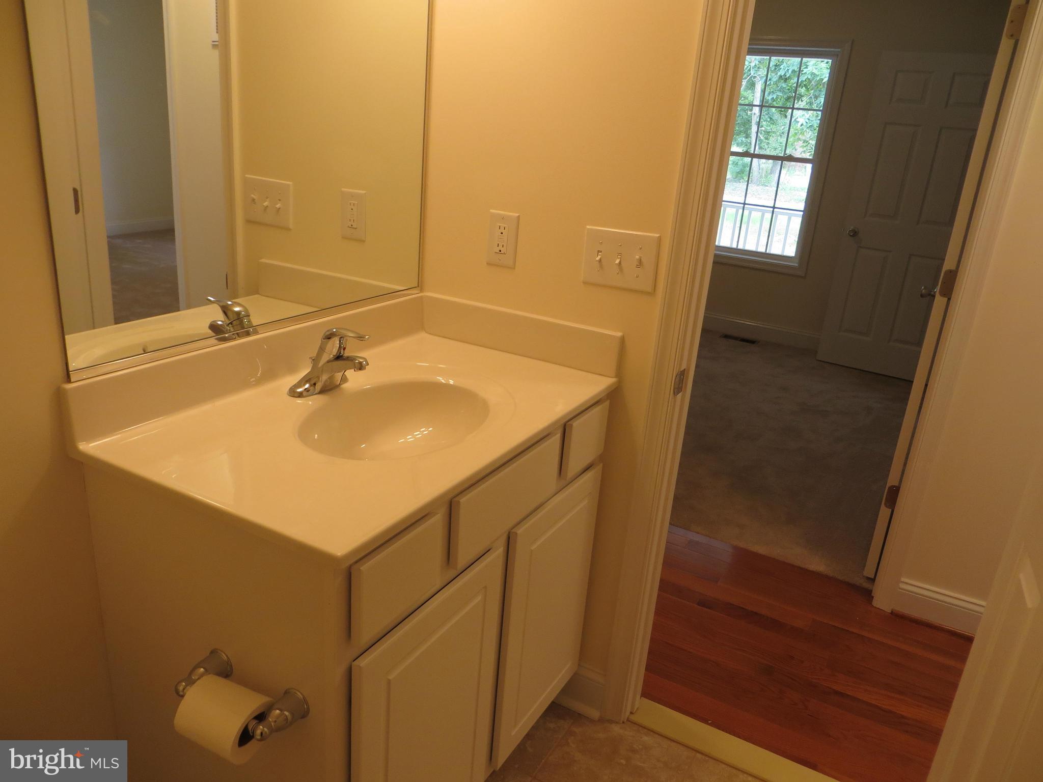 31253 Price Road Locust Grove, VA 22508 - Photo 15 of 24 Guest Bath with view to hall & BedRm