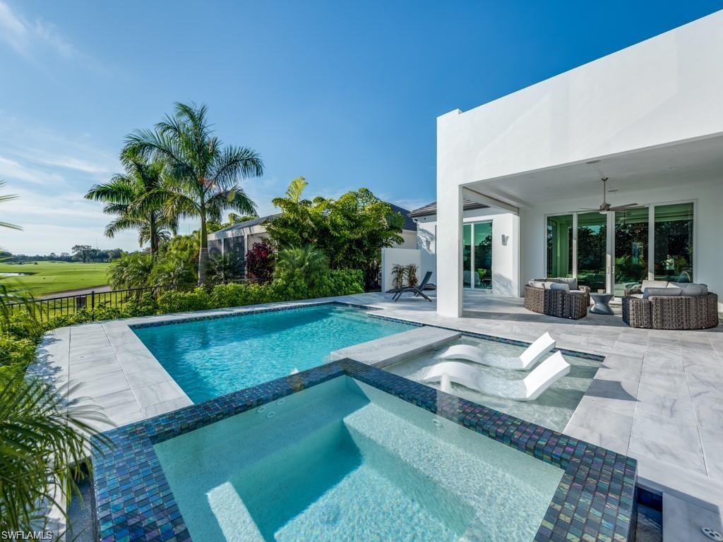 16892 Brightling Way Naples, FL 34110 - Photo 19 of 33 a view of swimming pool with patio