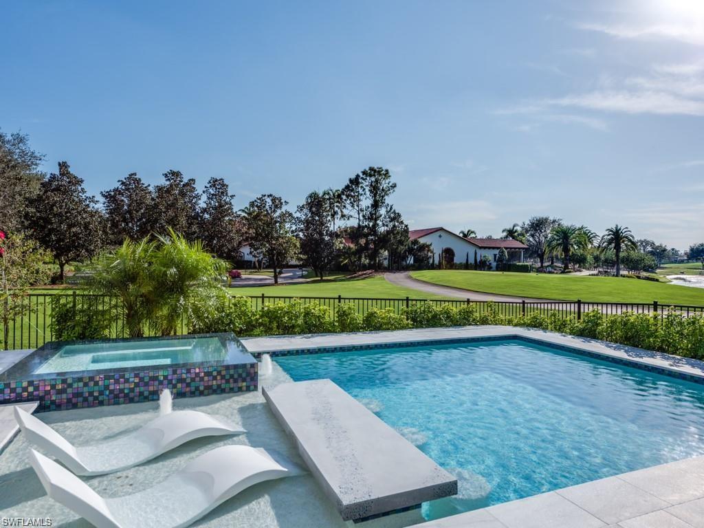 16892 Brightling Way Naples, FL 34110 - Photo 21 of 33 a view of a garden with an outdoor space