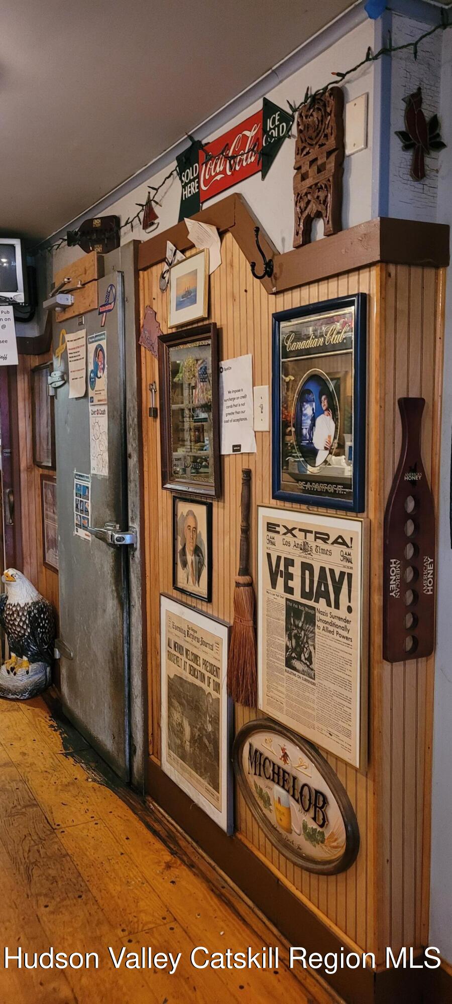 3663 Rte 67 Freehold, NY 12431 - Photo 27 of 36 a utility room with stainless steel appliances kitchen island granite countertop a refrigerator and a stove