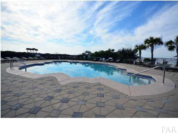 14900 River Road, Unit 308 Perdido Key, FL 32507 - Photo 21 of 24 Outdoor pool with spacious sun deck is located on Ole River so you can watch the boats pass by and enjoy nature at its best!