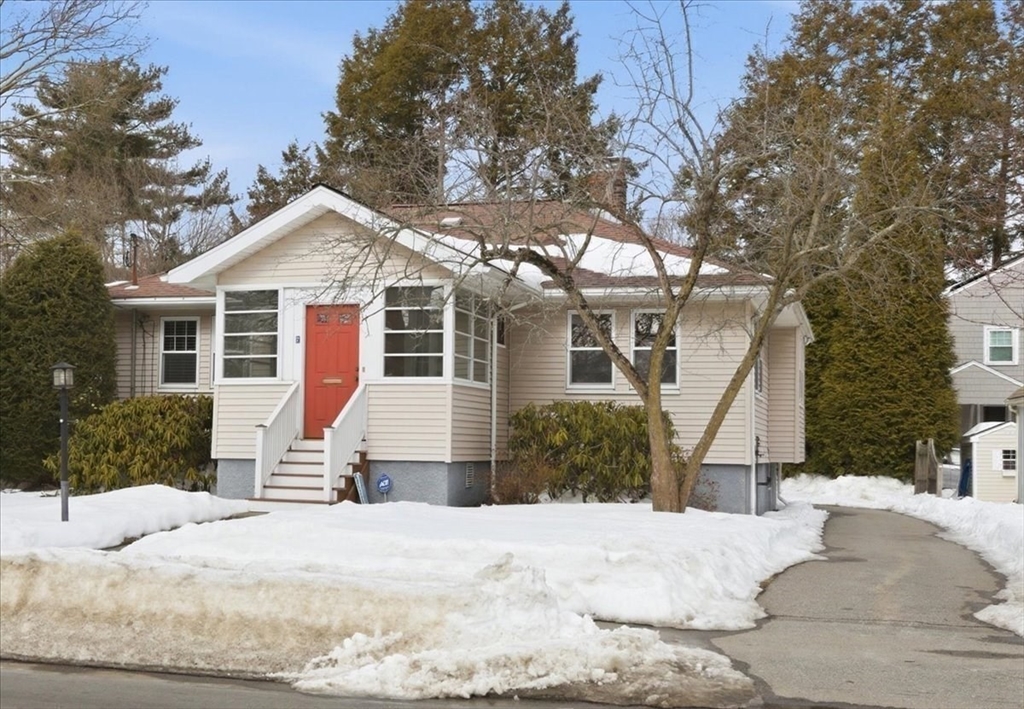 7 West Street Needham, MA 02494 - Photo 1 of 36 a front view of a house with a yard covered in snow