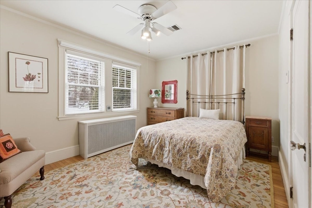 7 West Street Needham, MA 02494 - Photo 16 of 36 a bedroom with a bed and a window